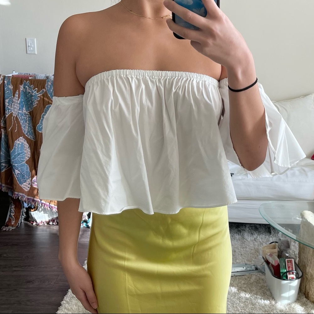 White flowy top with off the shoulder sleeves